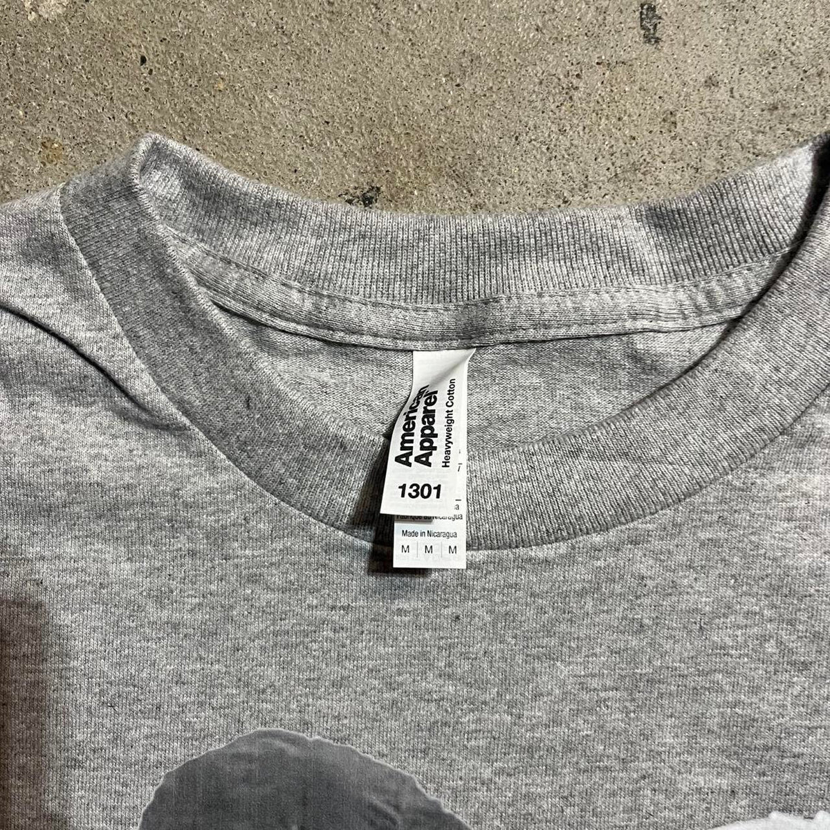 Upcycled Nettspend Graphic Tee Pre-Owned